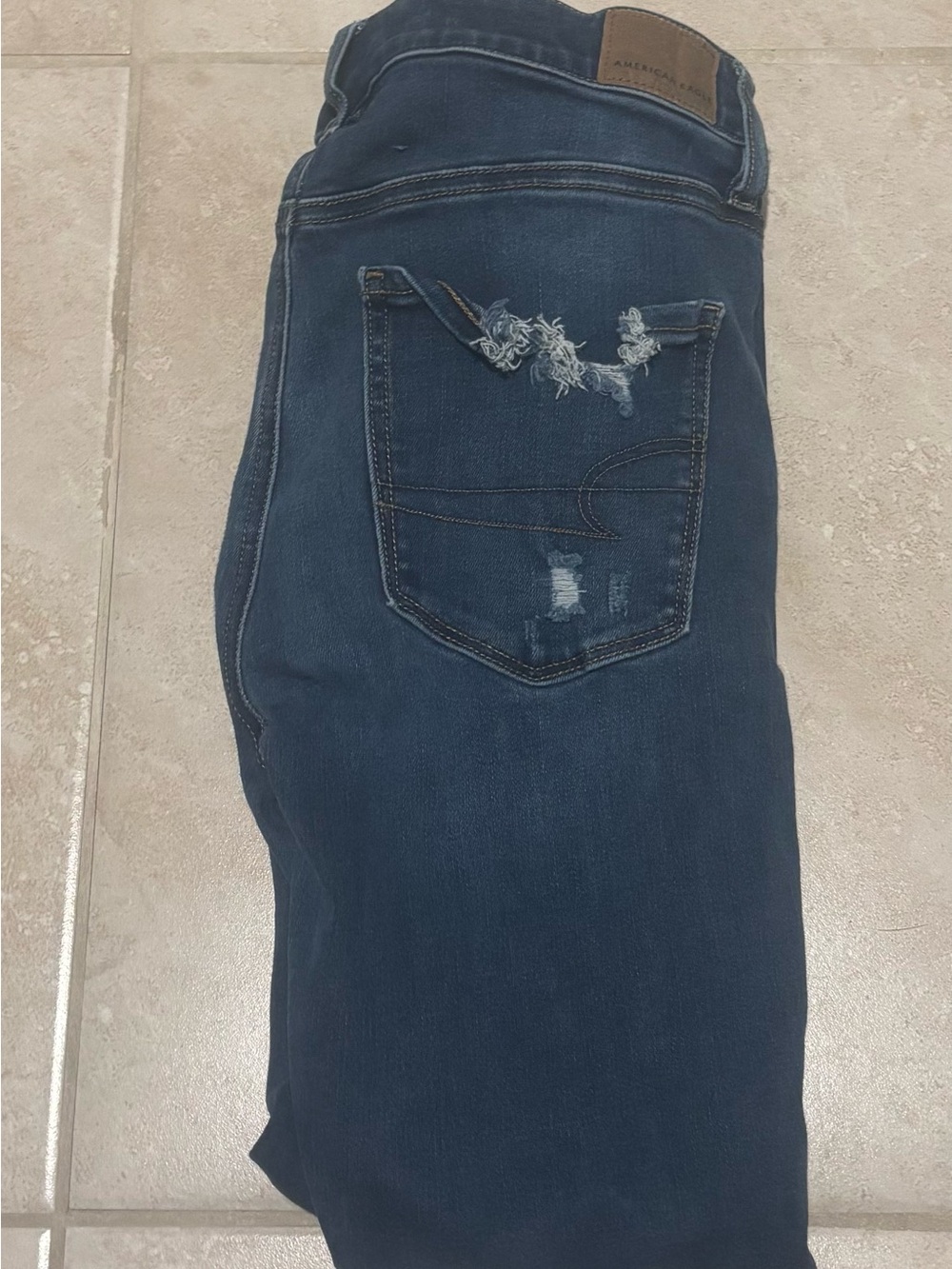 American Eagle Outfitters High-Rise Dark Blue Distressed Back Pocket Jeggings